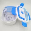 Portable Electric Heater Lunch Box plugged into 12V car outlet